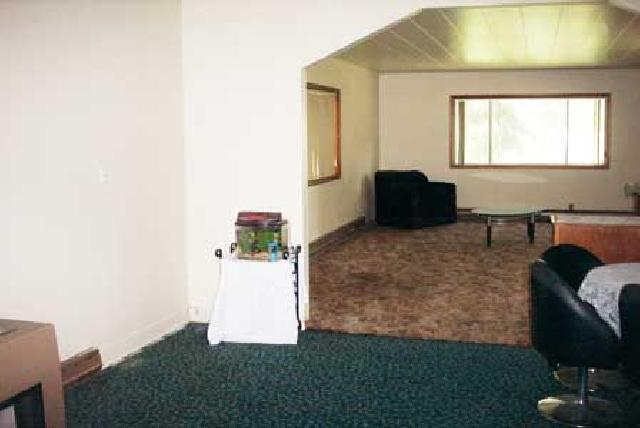 5606 Mieras Road Yakima, WA 98901 - Photo 4 of 9 a living room with furniture and a window