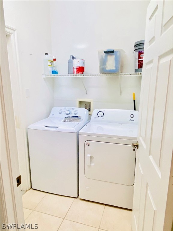 12914 Timber Ridge Drive Fort Myers, FL 33913 - Photo 13 of 21 a utility room with dryer and washer