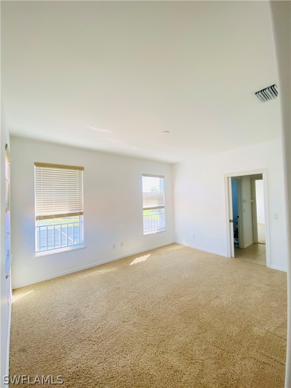 12914 Timber Ridge Drive Fort Myers, FL 33913 - Photo 19 of 21 a view of an empty room with a window