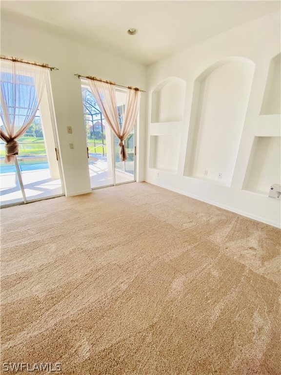 12914 Timber Ridge Drive Fort Myers, FL 33913 - Photo 4 of 21 a view of an empty room with a window