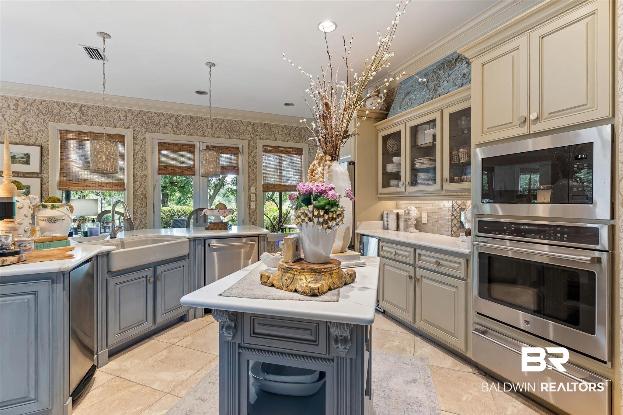 2905 Riverview Pointe Drive South Theodore, AL 36582 - Photo 10 of 44 Kitchen featuring a center island, pendant lighting, a warming drawer, stainless steel oven, and crown molding
