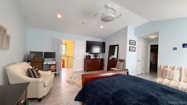a bedroom with a bed and furniture