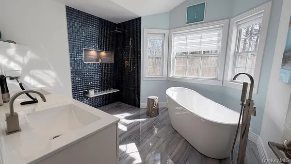 a bathroom with a sink and a tub