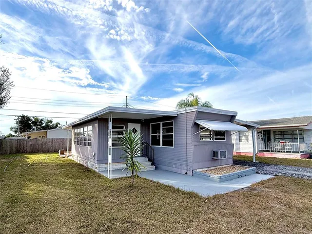 a view of a house with roof yard