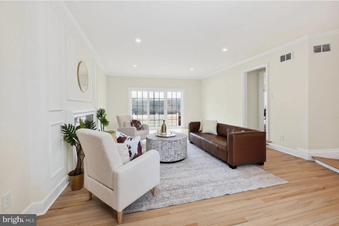 150 Windsor Road Robbinsville, NJ 08691 - Photo 13 of 60 a living room with furniture and wooden floor