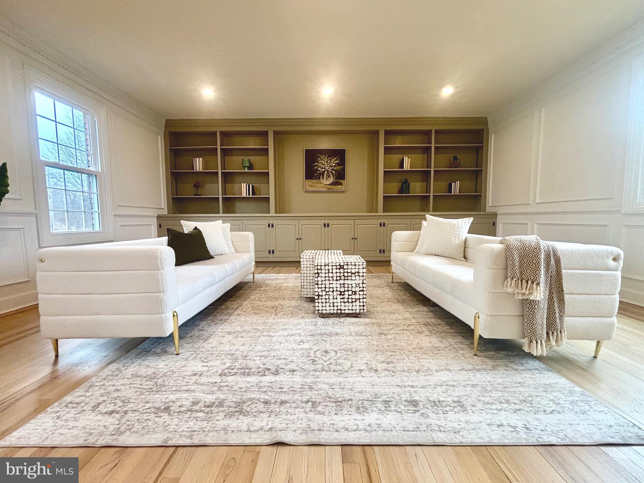 150 Windsor Road Robbinsville, NJ 08691 - Photo 22 of 60 a living room with furniture and a rug