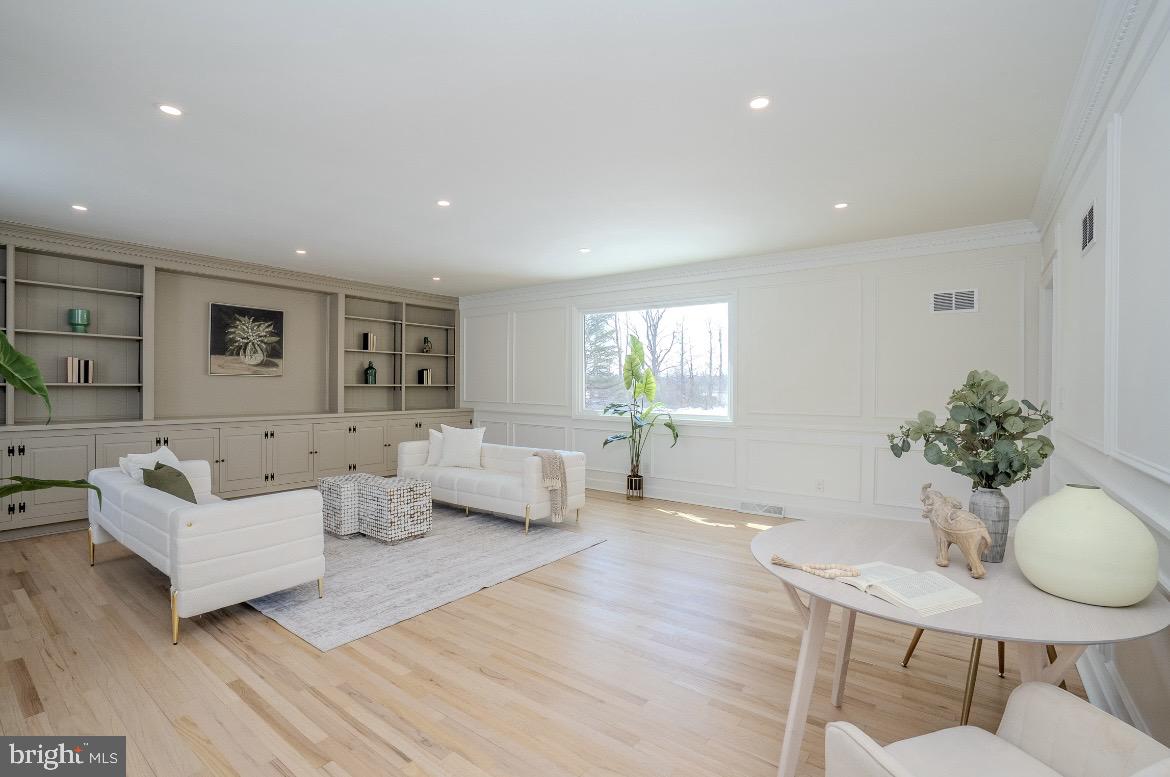 150 Windsor Road Robbinsville, NJ 08691 - Photo 25 of 60 a living room with furniture and a wooden floor