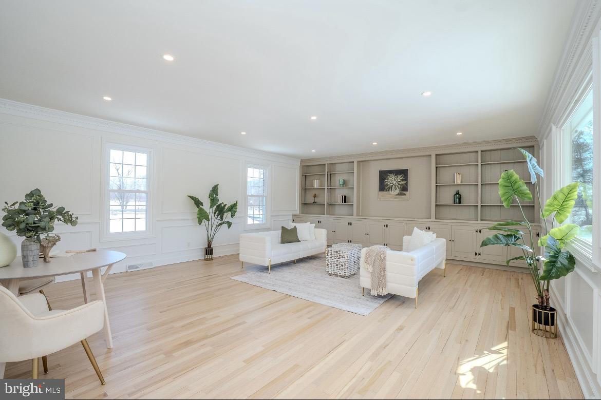 150 Windsor Road Robbinsville, NJ 08691 - Photo 26 of 60 a living room with furniture and a potted plant