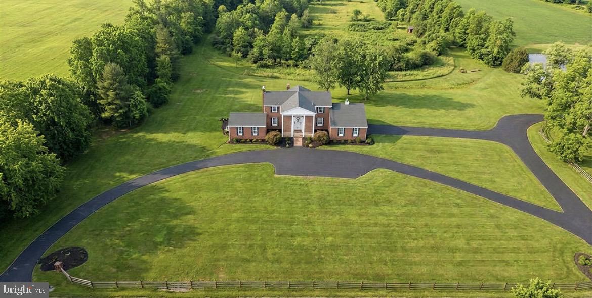 150 Windsor Road Robbinsville, NJ 08691 - Photo 3 of 60 a view of a yard with table and chairs