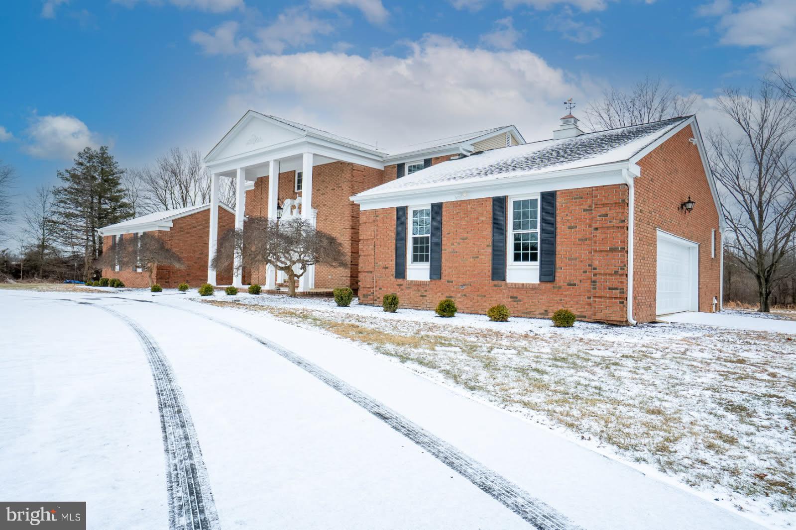 150 Windsor Road Robbinsville, NJ 08691 - Photo 4 of 60 a front view of a house with a yard