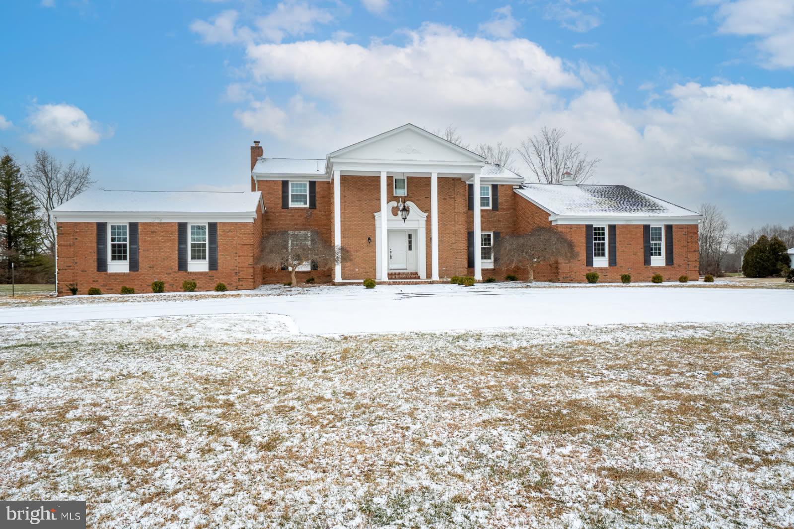 150 Windsor Road Robbinsville, NJ 08691 - Photo 5 of 60 a front view of a house with a yard