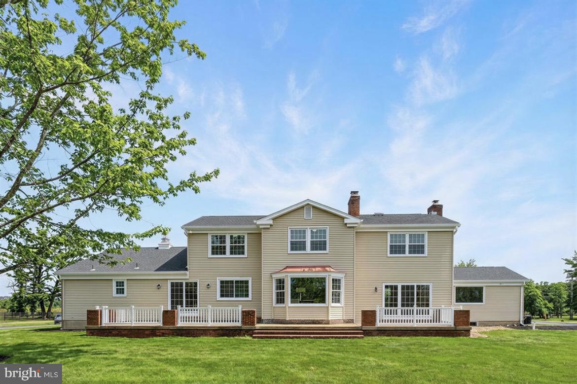 150 Windsor Road Robbinsville, NJ 08691 - Photo 55 of 60 a front view of a house with a garden