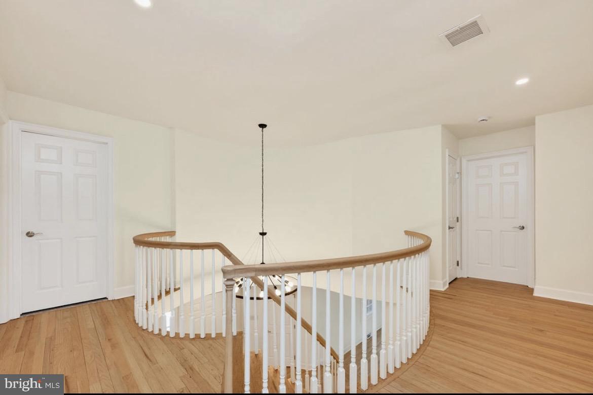 150 Windsor Road Robbinsville, NJ 08691 - Photo 9 of 60 a view of hallway with wooden floor