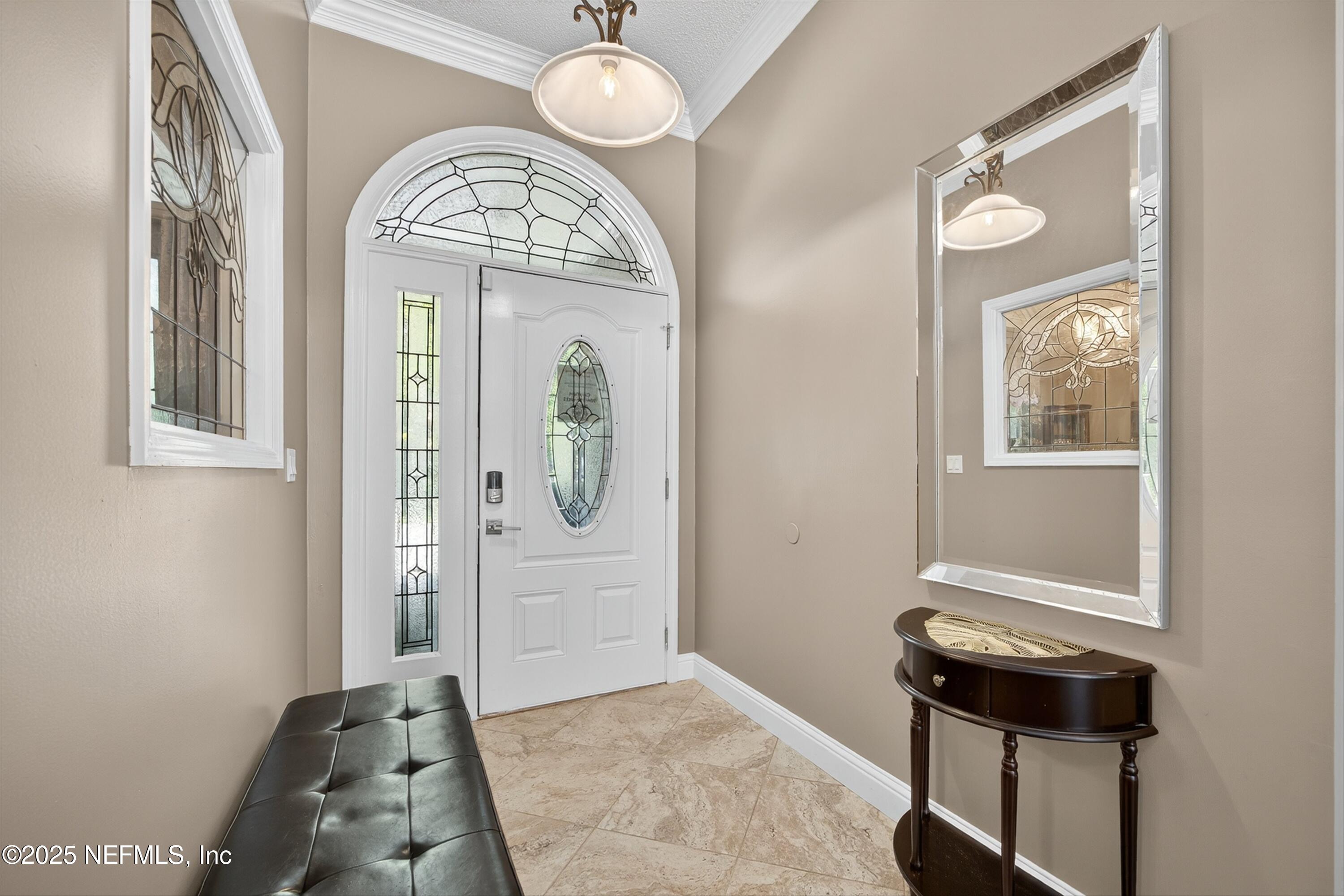 11341 V C Johnson Road Jacksonville, FL 32218 - Photo 6 of 70 a view of an entryway with wooden floor