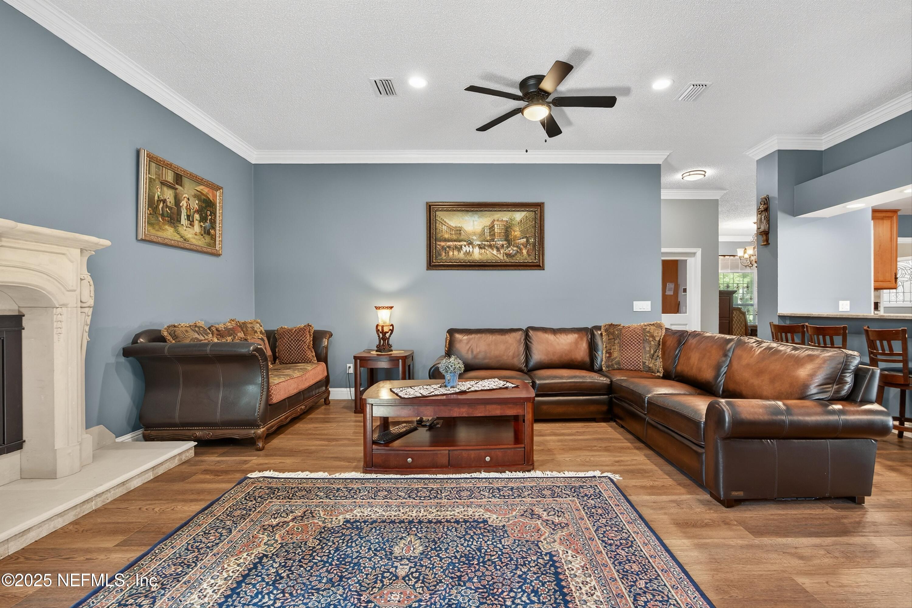 11341 V C Johnson Road Jacksonville, FL 32218 - Photo 8 of 70 a living room with furniture and a rug