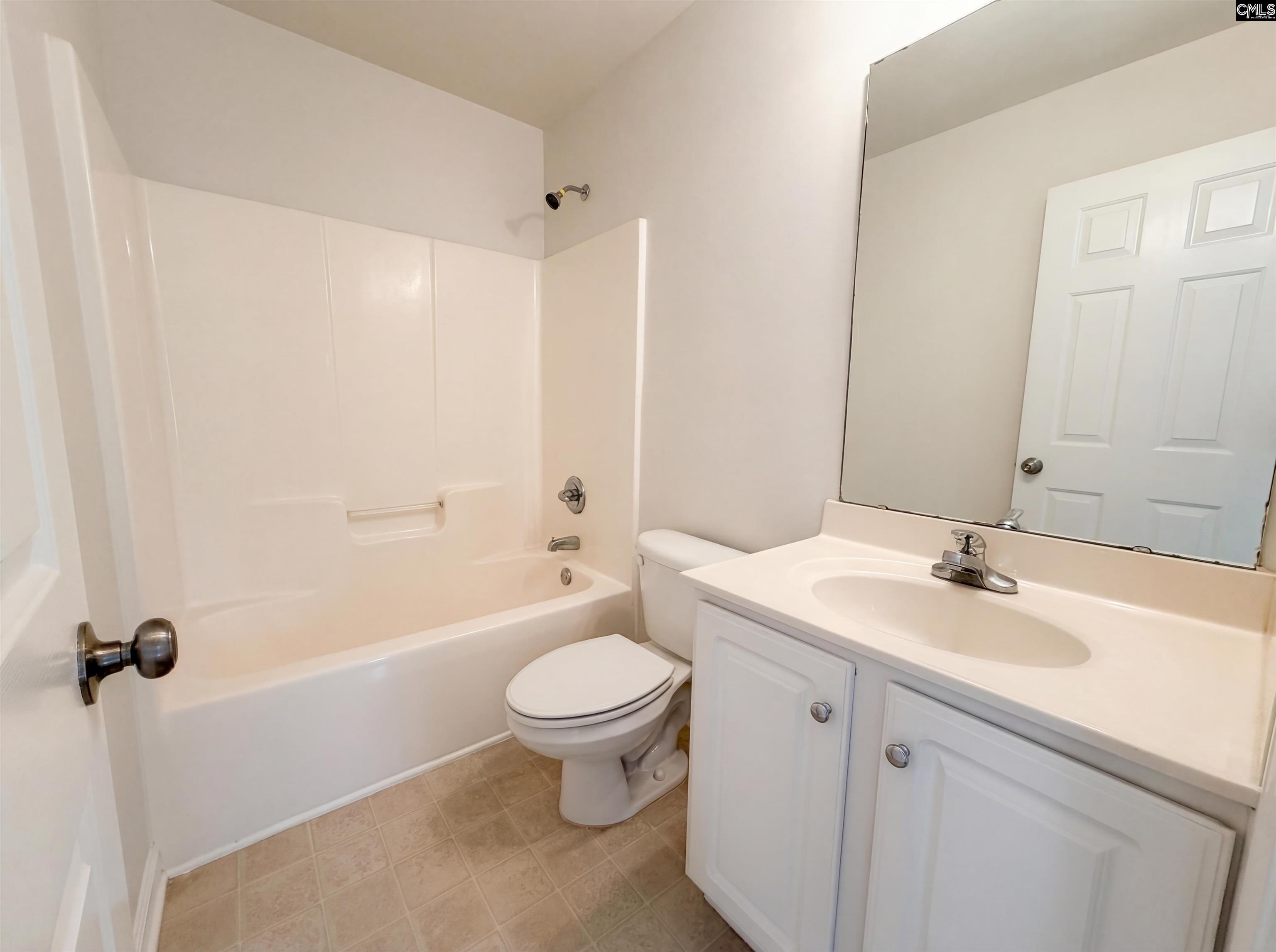 112 Coopers Hawk Circle Irmo, SC 29063 - Photo 23 of 26 a bathroom with a sink toilet tub and shower