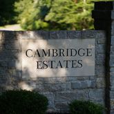 a view of outdoor space with signage and flags