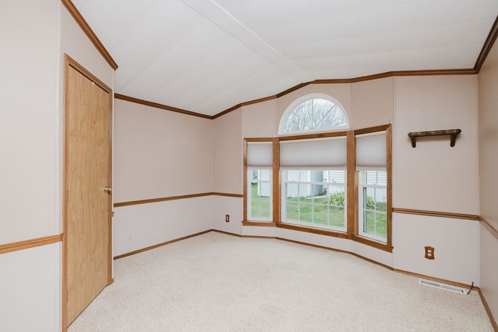 4 Tucker Terrace Raynham, MA 02767 - Photo 13 of 29 a view of entryway with wooden floor and window