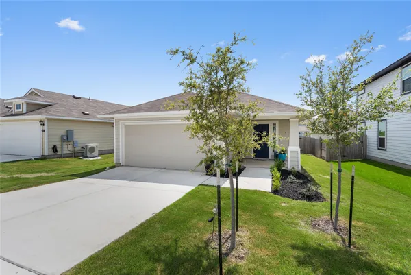 a house view with a garden space