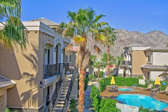 a view of multiple house with a yard