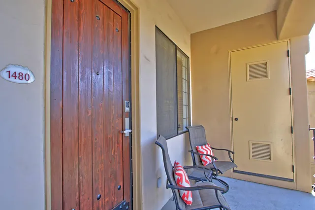 a room with furniture and wooden floor