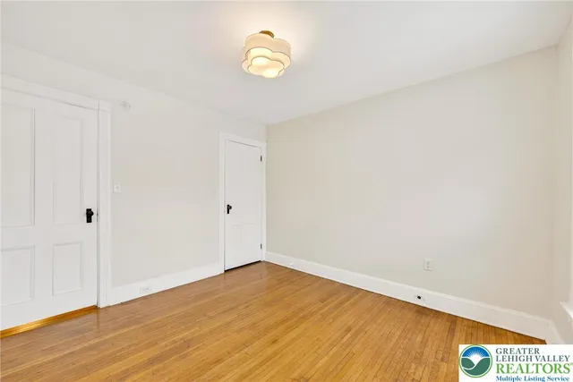 a kitchen with stainless steel appliances a refrigerator sink and microwave
