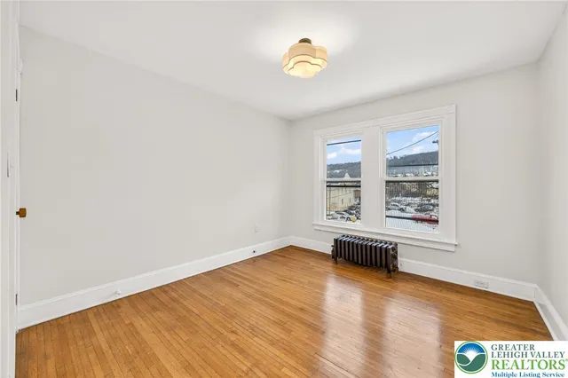 a view of a storage & utility room with dryer and washer