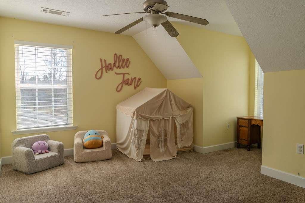 957 Bethlehem Road Rockmart, GA 30153 - Photo 22 of 33 a bedroom with a table and a window