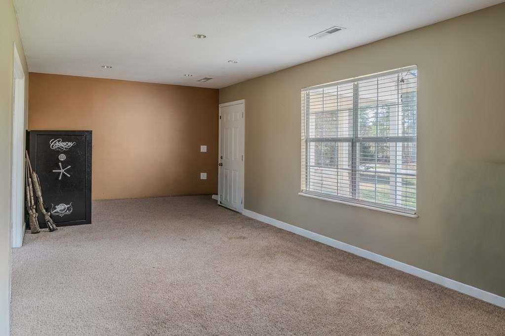957 Bethlehem Road Rockmart, GA 30153 - Photo 23 of 33 a view of an empty room with closet and a window