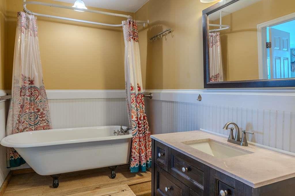 957 Bethlehem Road Rockmart, GA 30153 - Photo 26 of 33 a bathroom with a sink and a mirror
