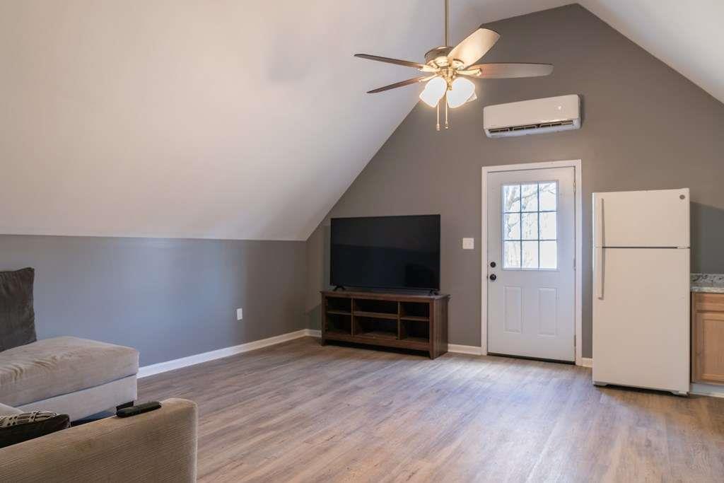 957 Bethlehem Road Rockmart, GA 30153 - Photo 29 of 33 a living room with furniture and a flat screen tv