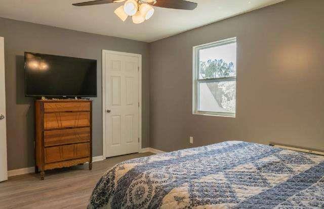 957 Bethlehem Road Rockmart, GA 30153 - Photo 31 of 33 a bedroom with a bed and a flat screen tv