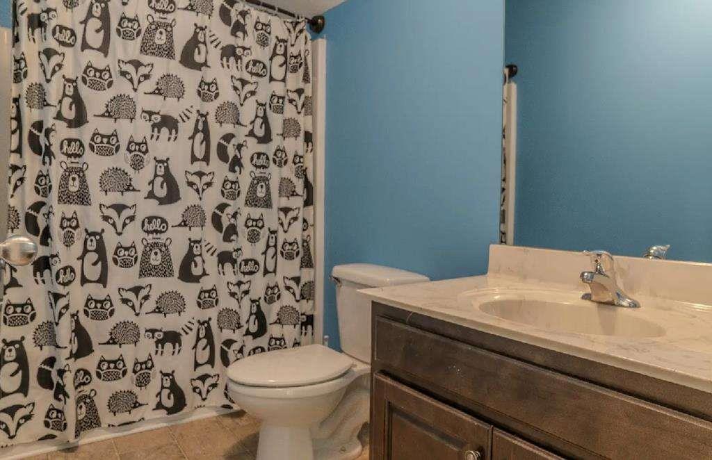 957 Bethlehem Road Rockmart, GA 30153 - Photo 32 of 33 a bathroom with a sink and a toilet