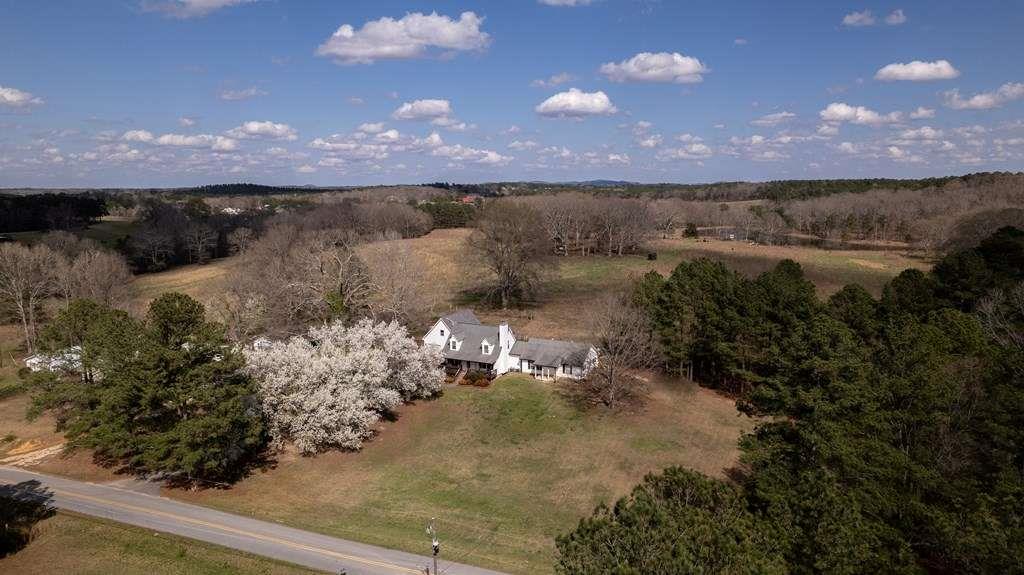 957 Bethlehem Road Rockmart, GA 30153 - Photo 4 of 33 a view of a lake in the sunset