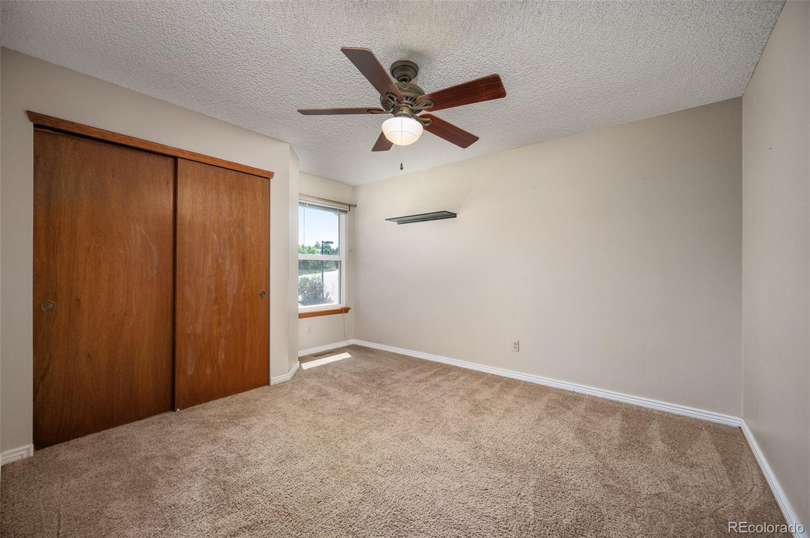 7412 Berkeley Court Castle Pines, CO 80108 - Photo 22 of 37 a view of an empty room
