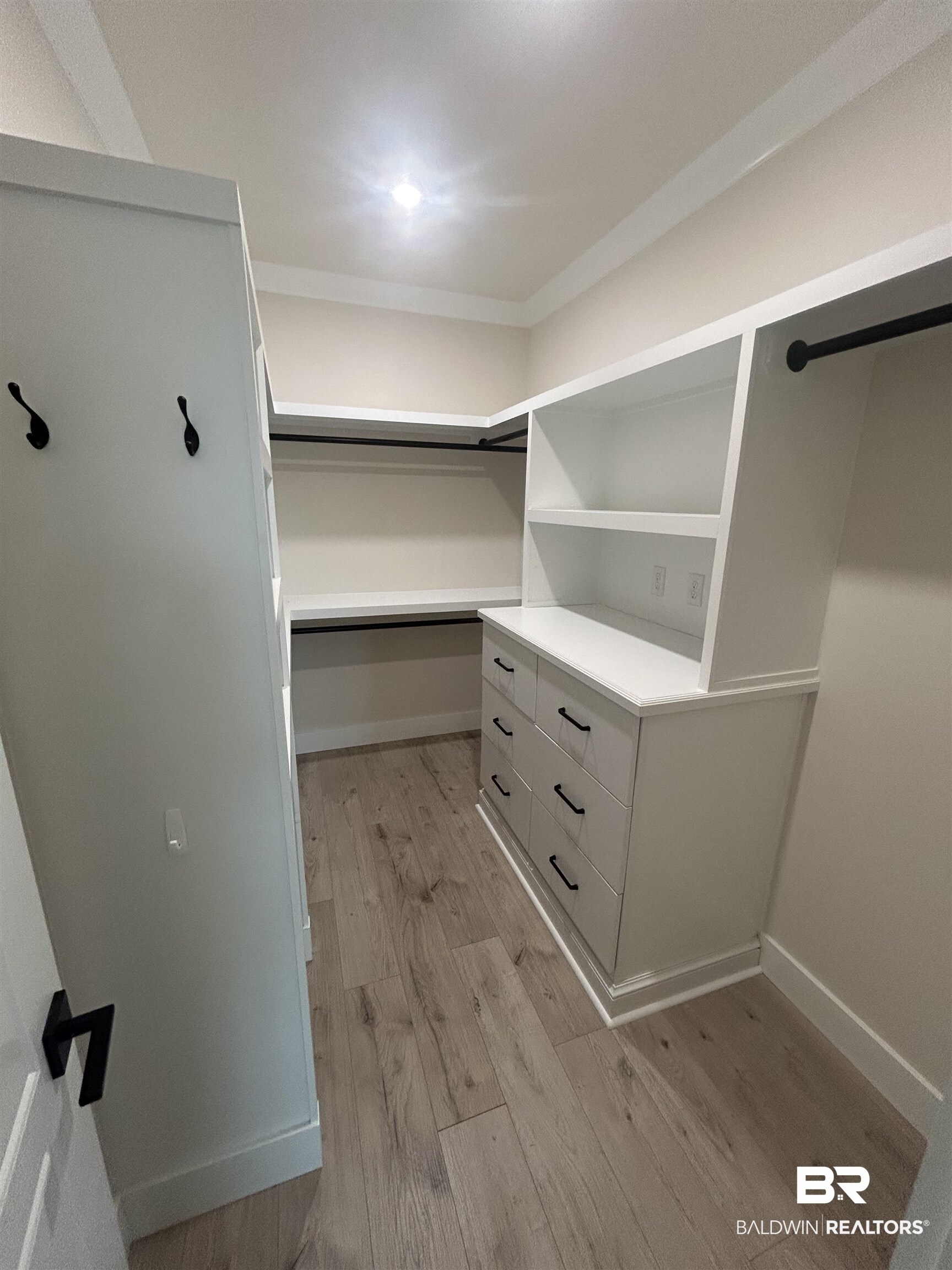 5122 Pine Road Orange Beach, AL 36561 - Photo 19 of 24 Walk in closet featuring light wood finished floors