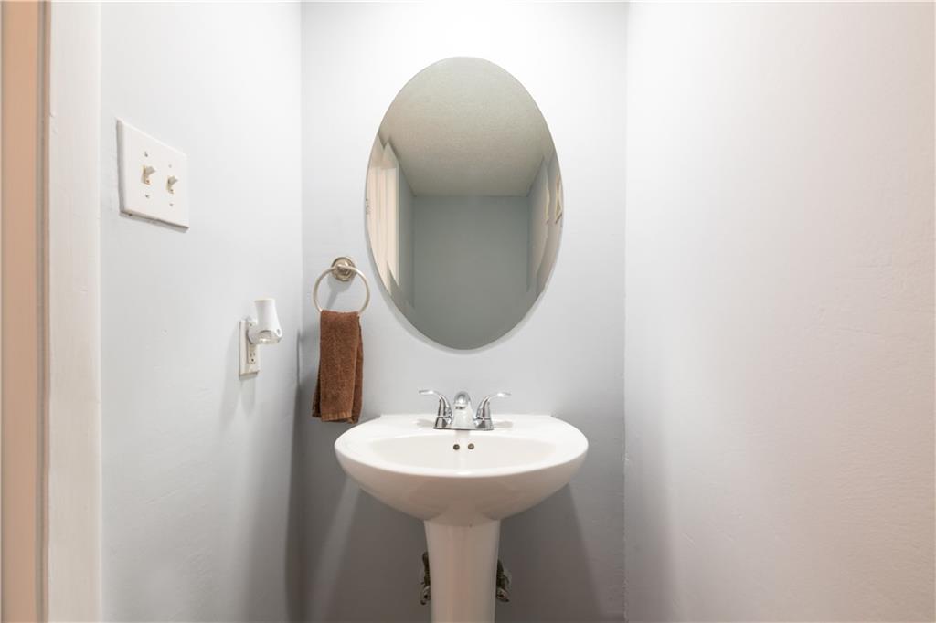 3301 Henderson Mill Road, Unit X4 Atlanta, GA 30341 - Photo 18 of 36 a bathroom with a sink and a mirror