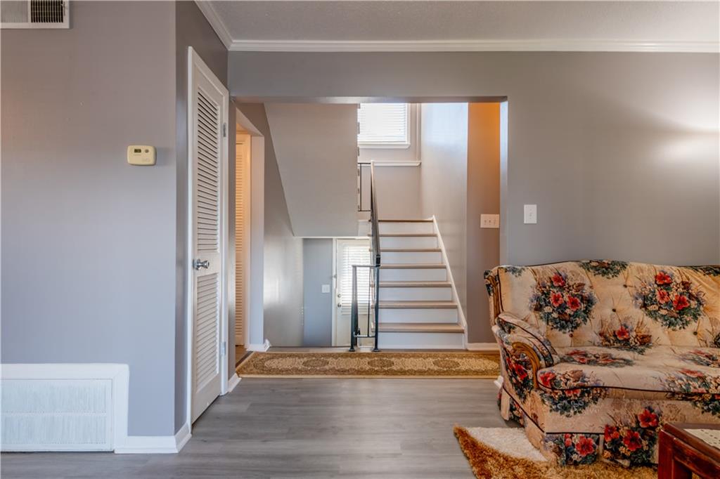 3301 Henderson Mill Road, Unit X4 Atlanta, GA 30341 - Photo 3 of 36 a view of a room with wooden floor and entryway