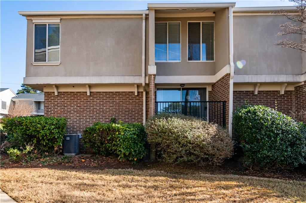 3301 Henderson Mill Road, Unit X4 Atlanta, GA 30341 - Photo 34 of 36 front view of a house