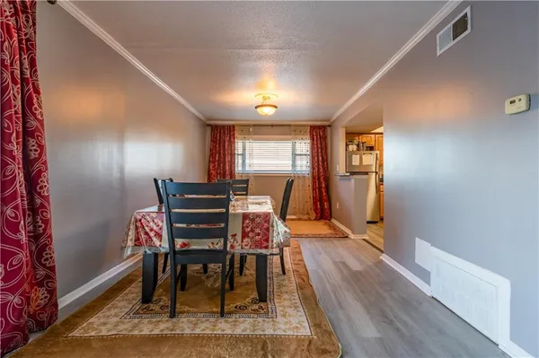 a view of a livingroom with furniture
