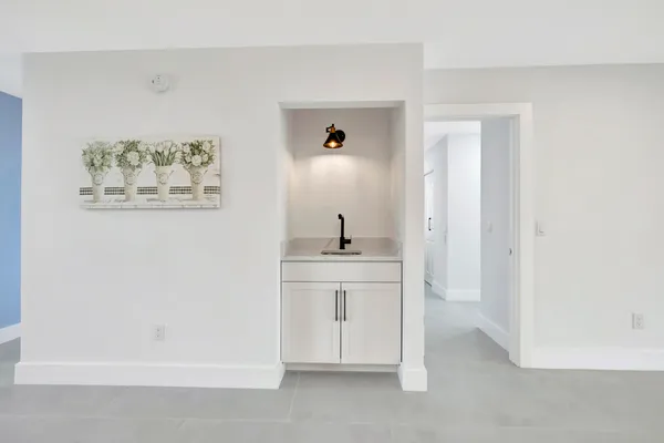 a view of cabinets with wooden floor