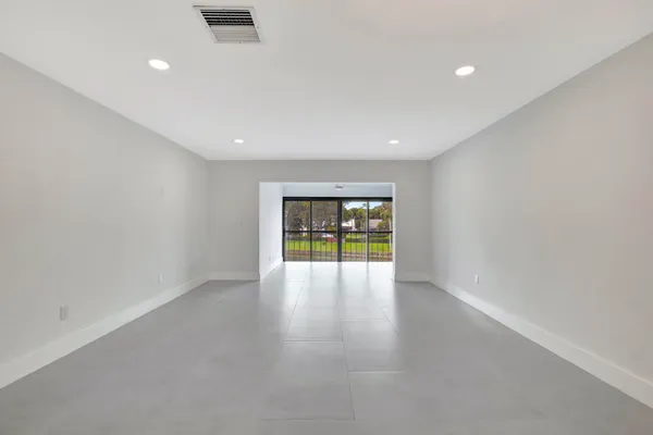 an empty room with window