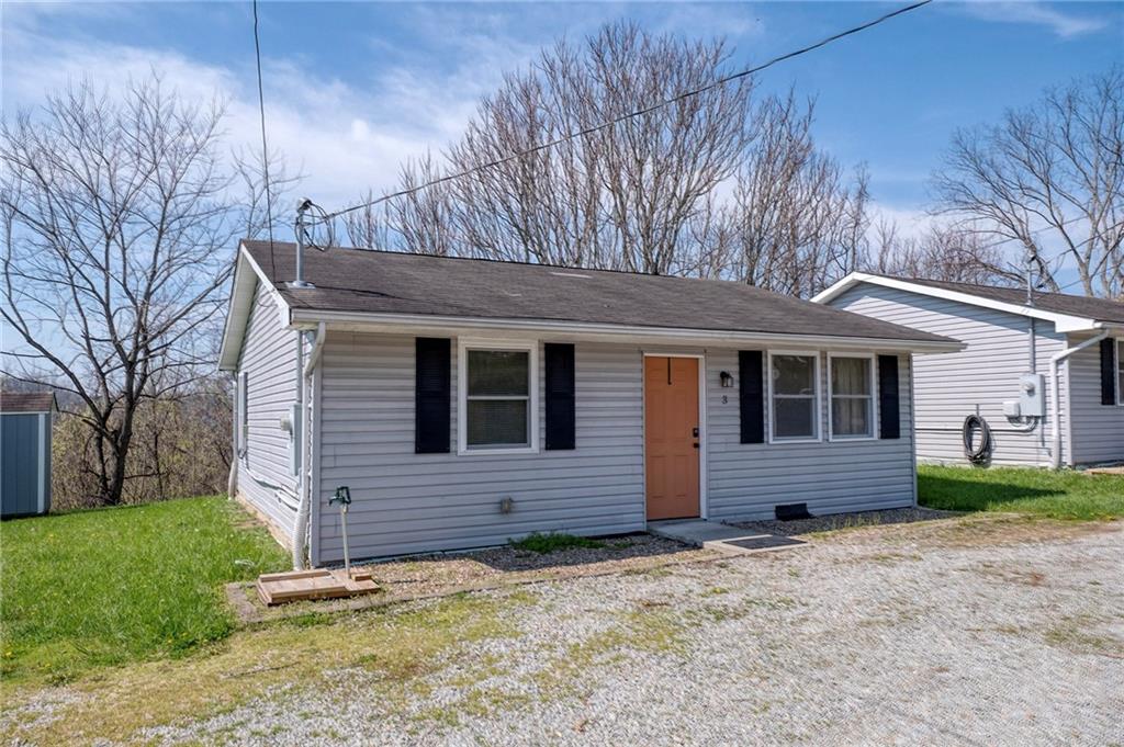 249 Washington Road, Unit 3 Waynesburg, PA 15370 - Photo 1 of 10 a front view of a house with garden