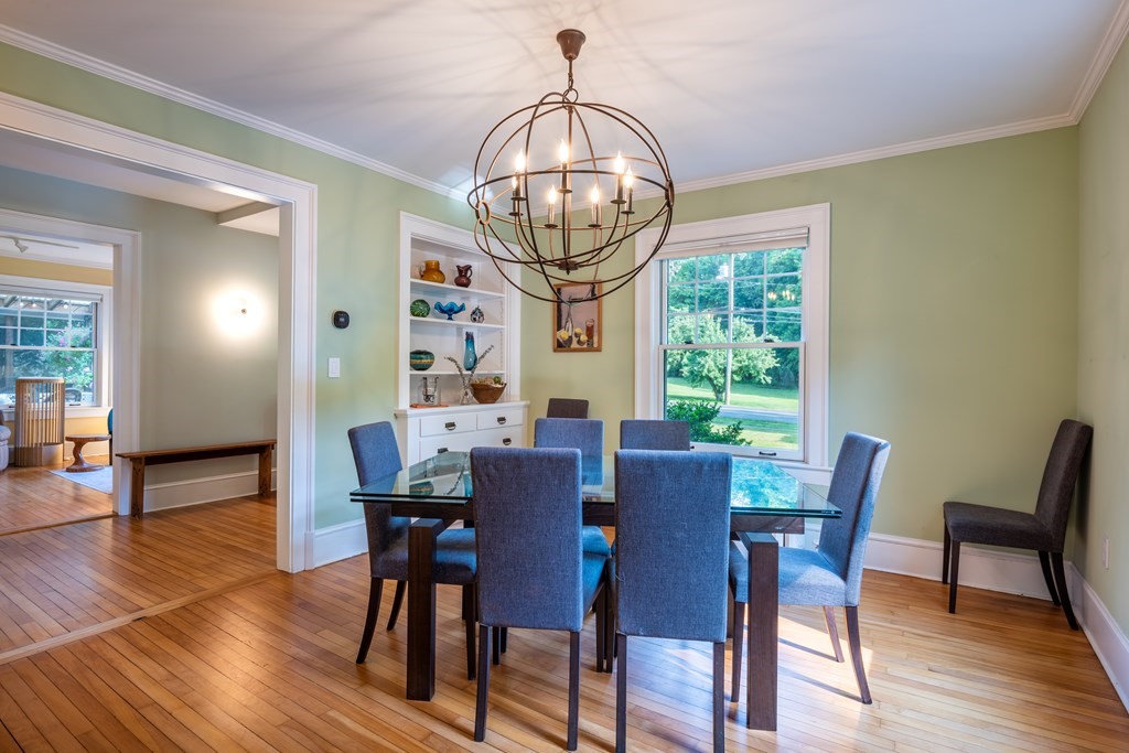 54 Snell Street Amherst, MA 01002 - Photo 13 of 42 a view of a dining room with furniture window and wooden floor