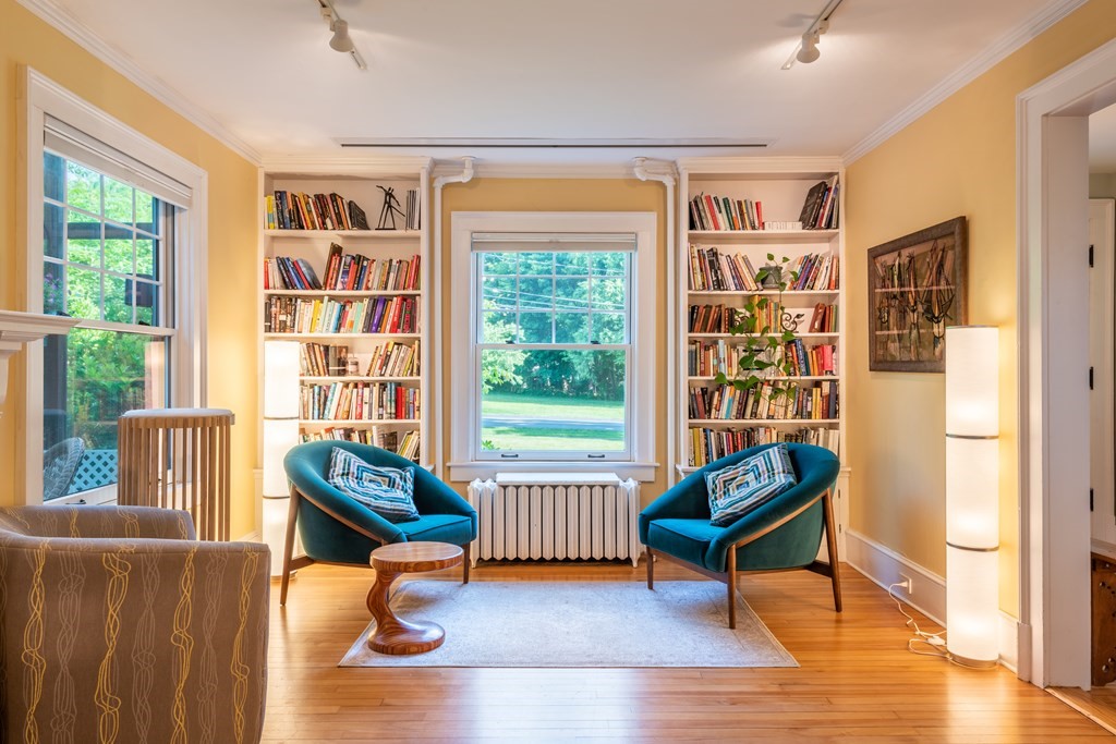 54 Snell Street Amherst, MA 01002 - Photo 17 of 42 a living room with furniture and a window