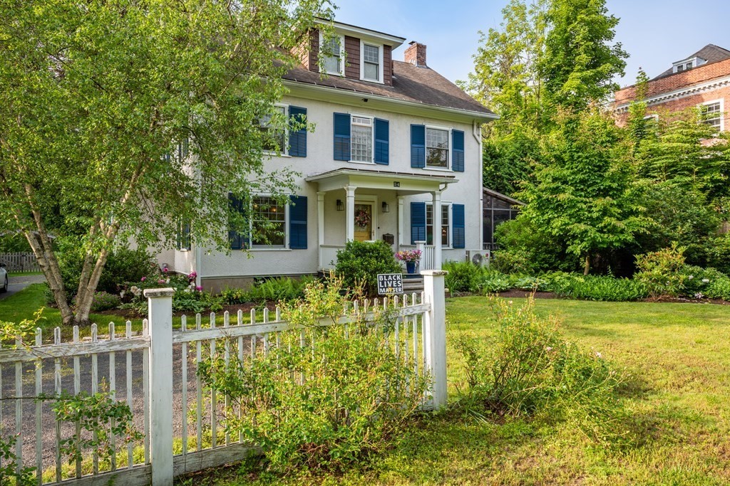 54 Snell Street Amherst, MA 01002 - Photo 2 of 42 a front view of house with yard and green space