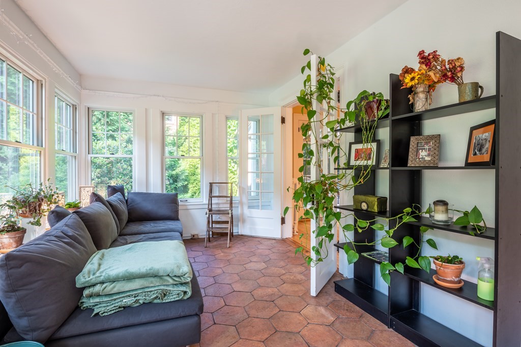 54 Snell Street Amherst, MA 01002 - Photo 24 of 42 a living room with furniture and a potted plant