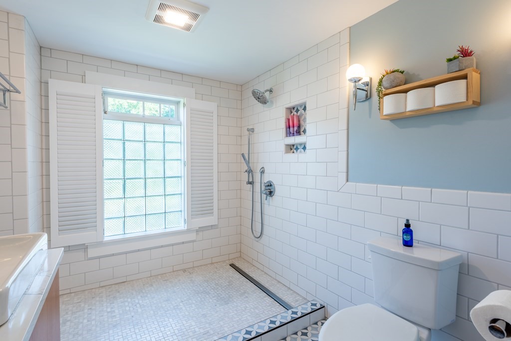 54 Snell Street Amherst, MA 01002 - Photo 35 of 42 a bathroom with a toilet and a shower