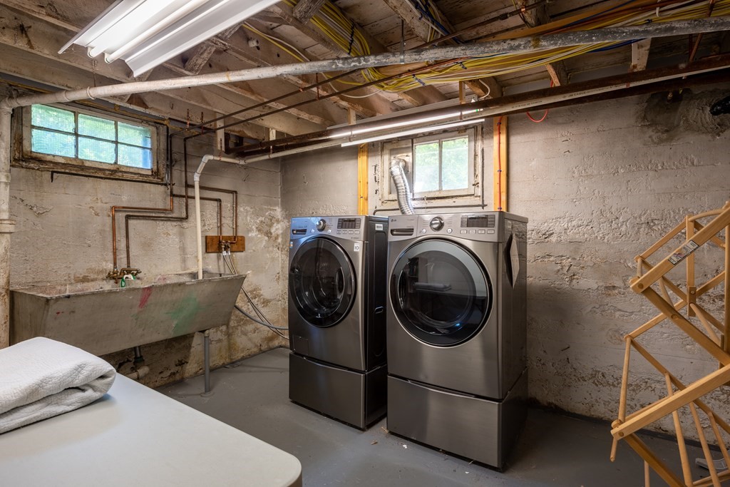 54 Snell Street Amherst, MA 01002 - Photo 41 of 42 a utility room with dryer and washer