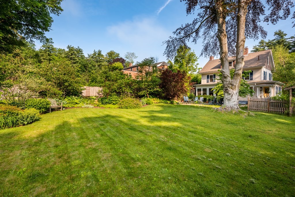 54 Snell Street Amherst, MA 01002 - Photo 8 of 42 a view of yard with swimming pool and green space